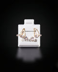 Arete ajustable ear cuffs con zirconias blancas 10k