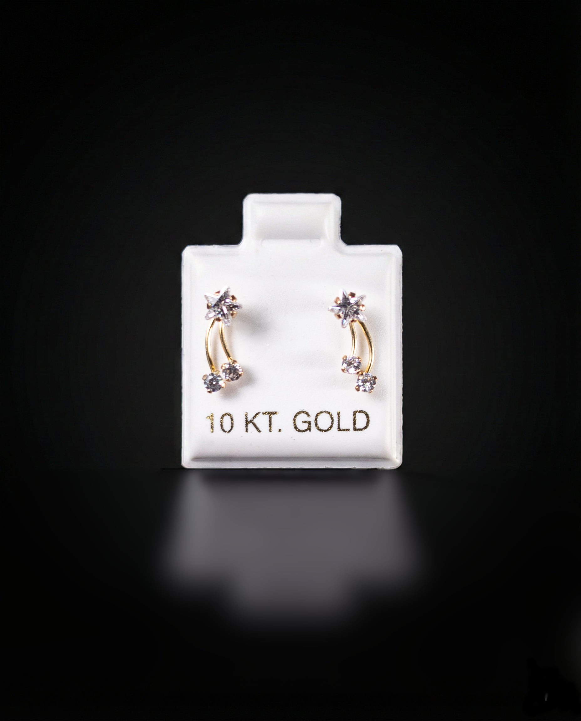 Aretes estrella con zirconias blancas 10k