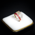 Anillo 15 años zirc. roja 10k