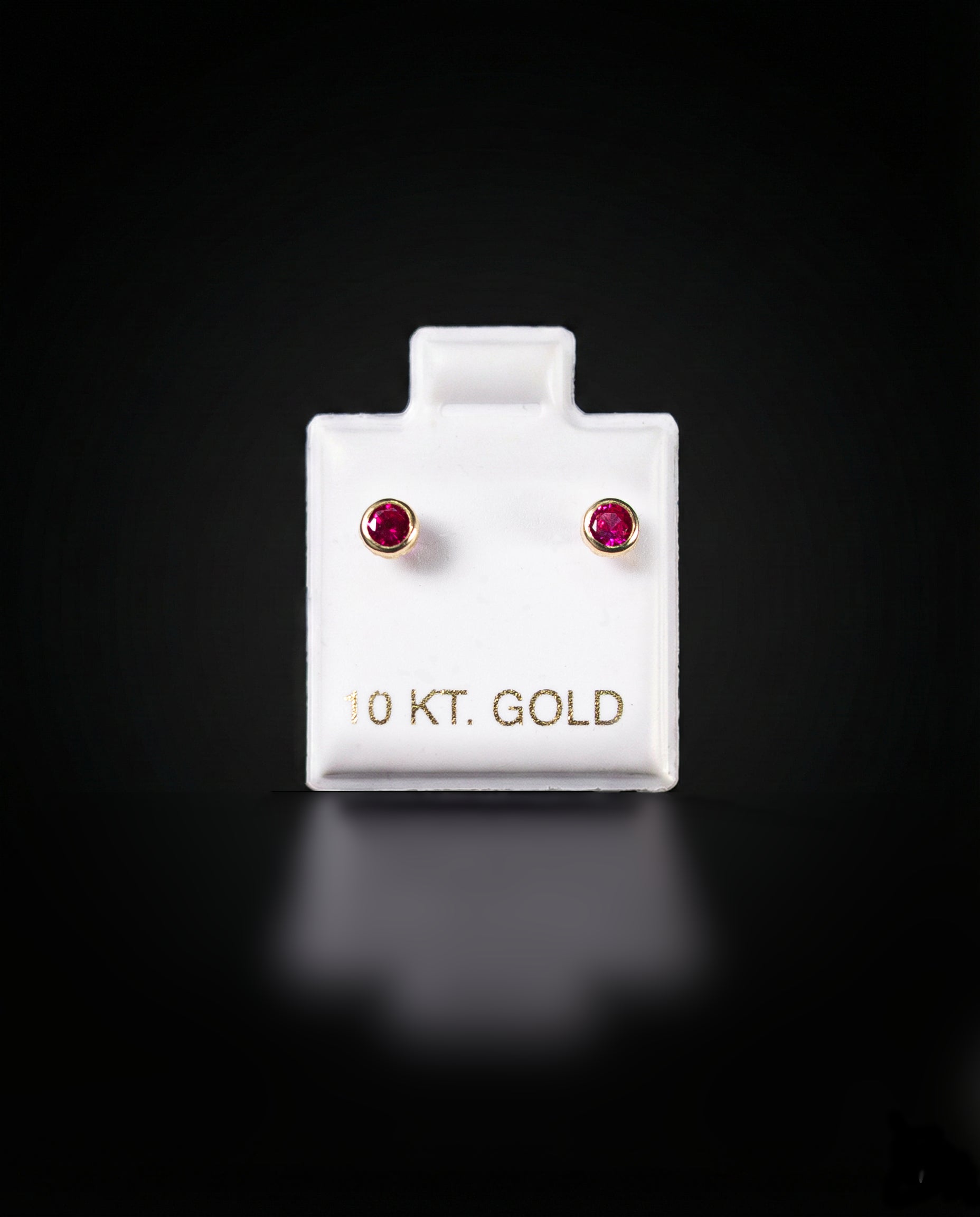 Aretes zirconia roja 10k