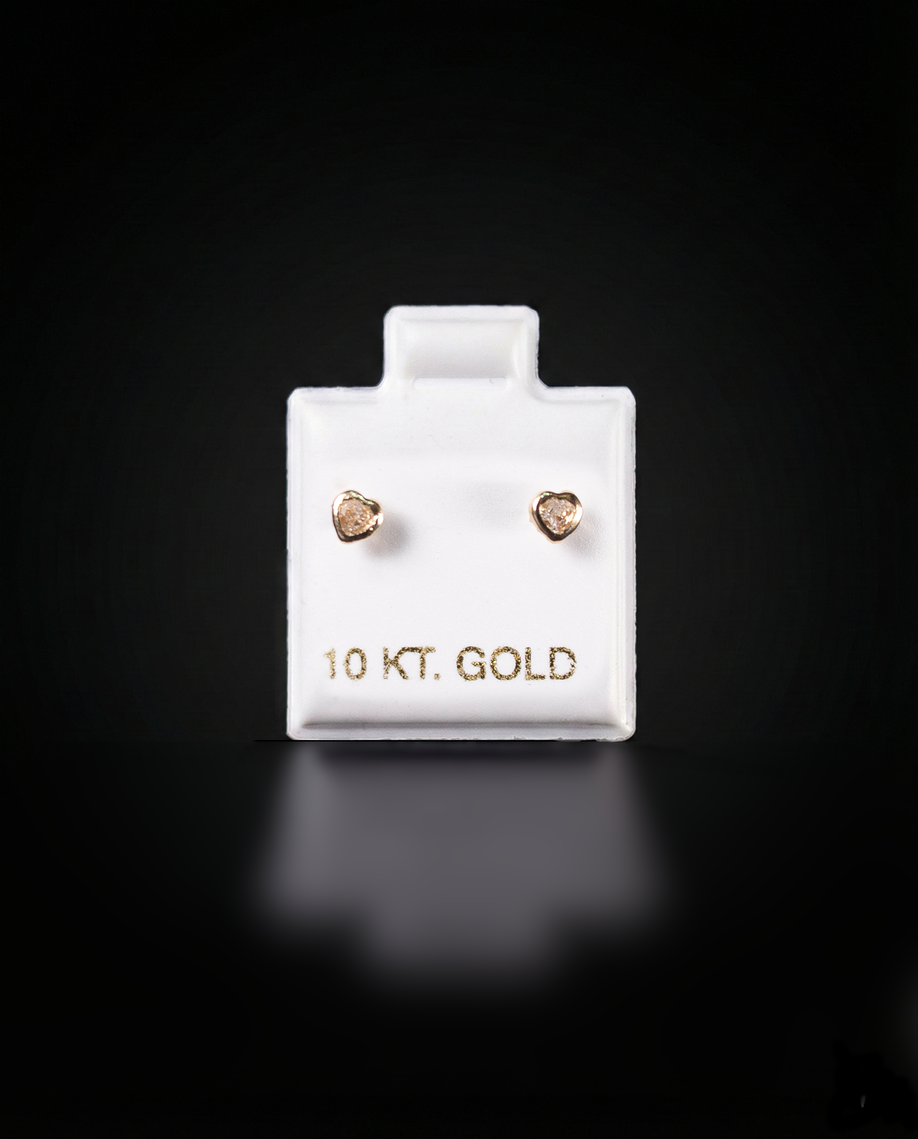 Aretes corazón con zirconias blancas 10k