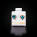 Aretes corazón celeste con zirconias blancas 14k