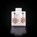 Aretes colgantes con zirconias blancas y rosadas 14k