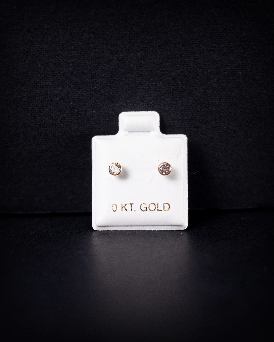 Aretes con Zirconia Blanca y bisel 10k