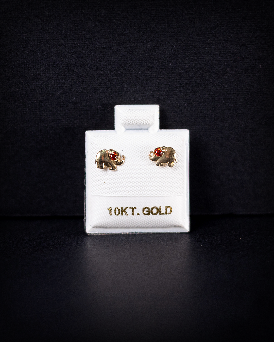 Aretes elefante y zirconia roja 10k